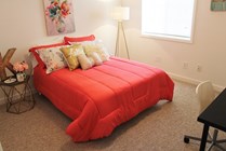 Private bedrooms come fully furnished including a desk and chair.