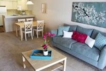 Open-concept kitchens with extra space for a dining room table.