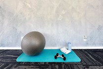 Unwind and energize in our 24-hour fitness center's dedicated yoga studio, offering a tranquil space for yoga practice. 