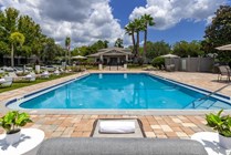 Take a refreshing dip in our glimmering resort-style pool, offering a delightful escape and rejuvenation from daily stressors. 